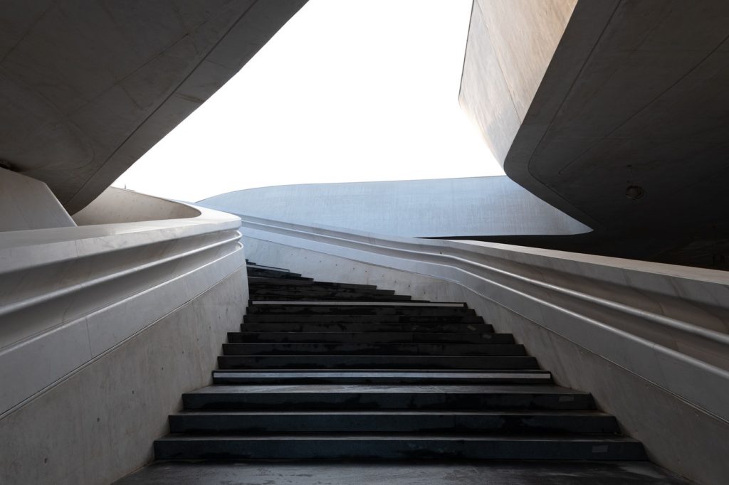 modern-architecture-and-empty-staircase-leading-to-a-bright-open-space.jpg